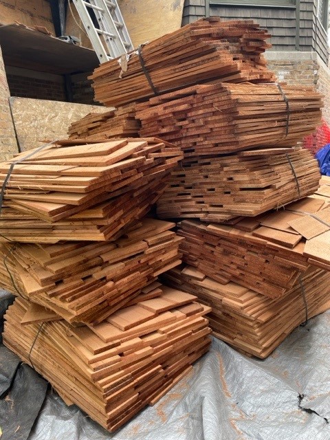 Bundles of new cedar shingles.
