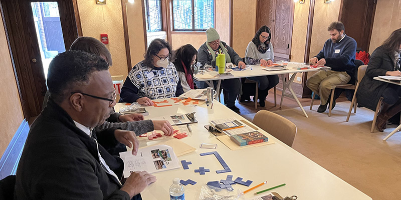 During The Wright 3: Pentominoes and Geometry session, teachers work with 2D pentominoes in Robie House’s playroom to create architectural floorplans.