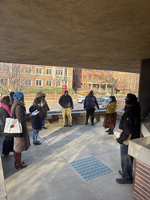 Inspired by the characters of the Wright 3, participants in the The Wright 3: Pentominoes and Geometry session stand on Robie House’s front porch and write a poem about their experience in the space.
